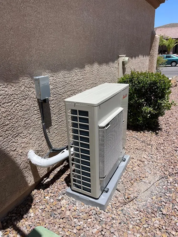 Residential air conditioning condenser unit in Andrews